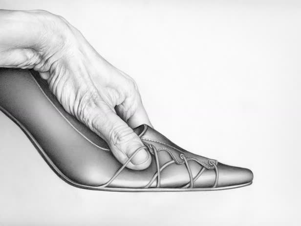 Male Hand Grasping Womans Stiletto Shoe