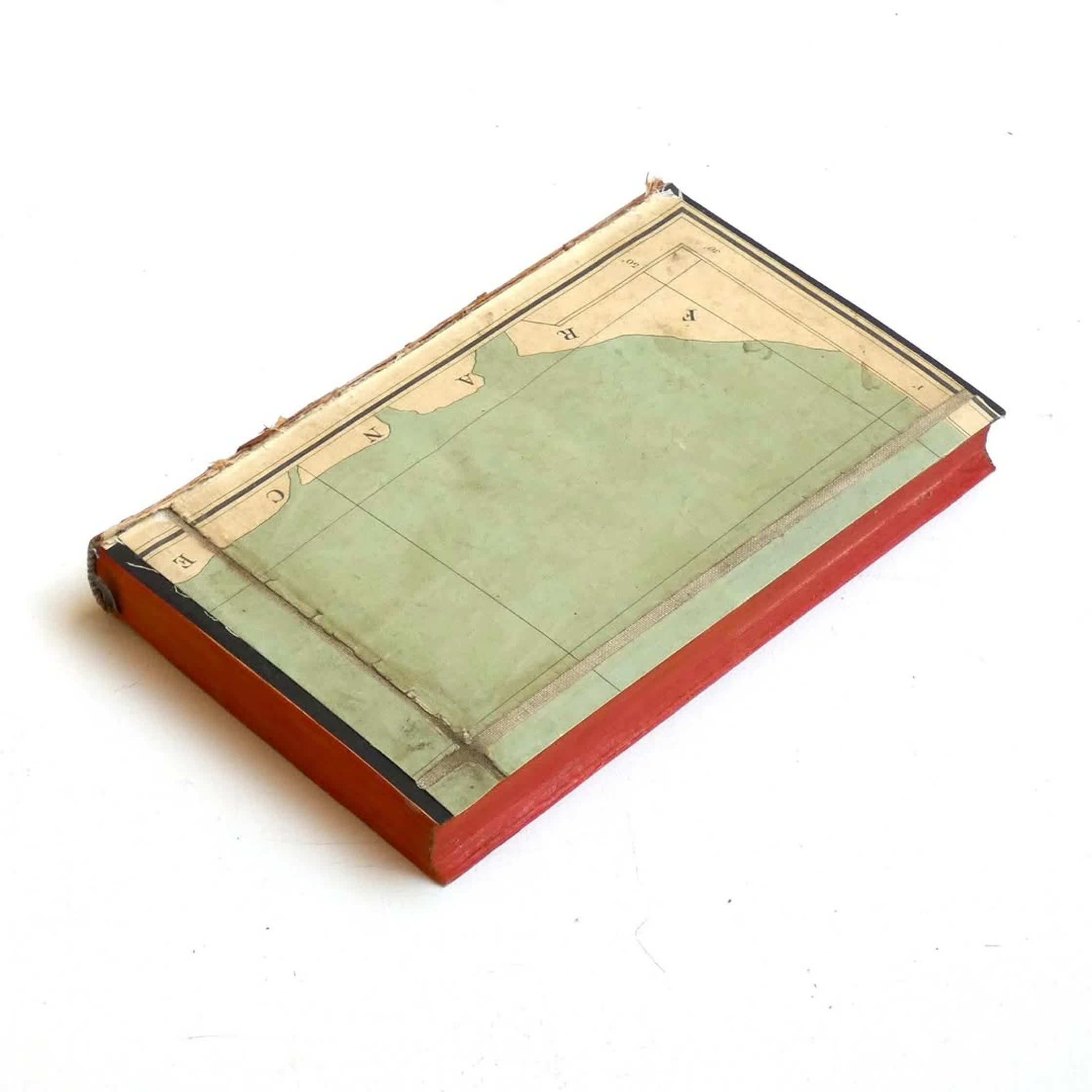 bibliotek - collage on a found book (1).jpg