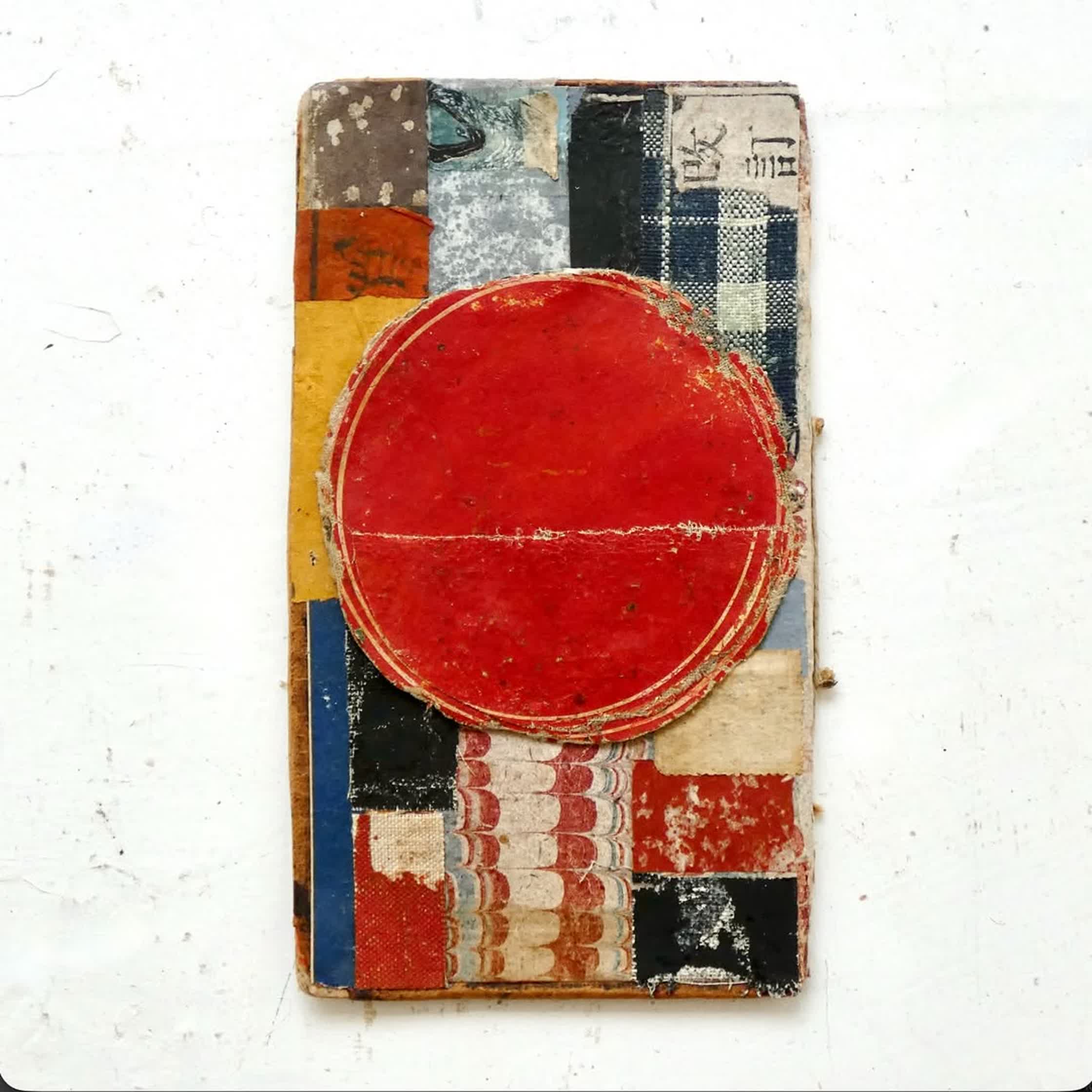 Updates to changes series- collage on found book end-boards.jpg