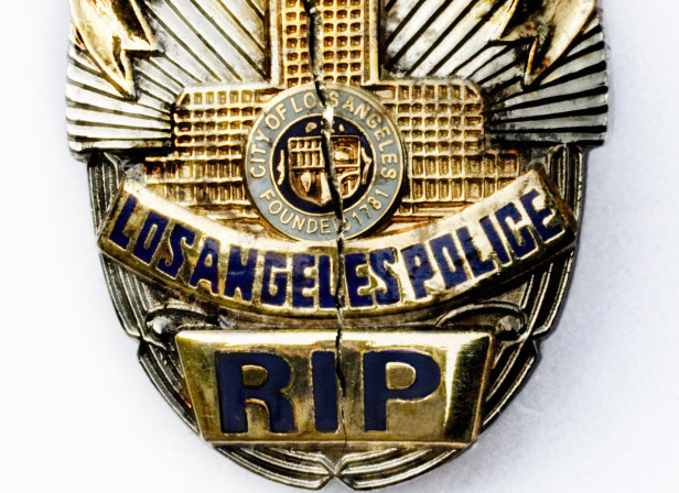 LAPD Badge Cracked / The Guide Magazine