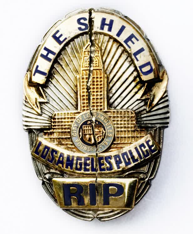 LAPD Badge Cracked / The Guide Magazine